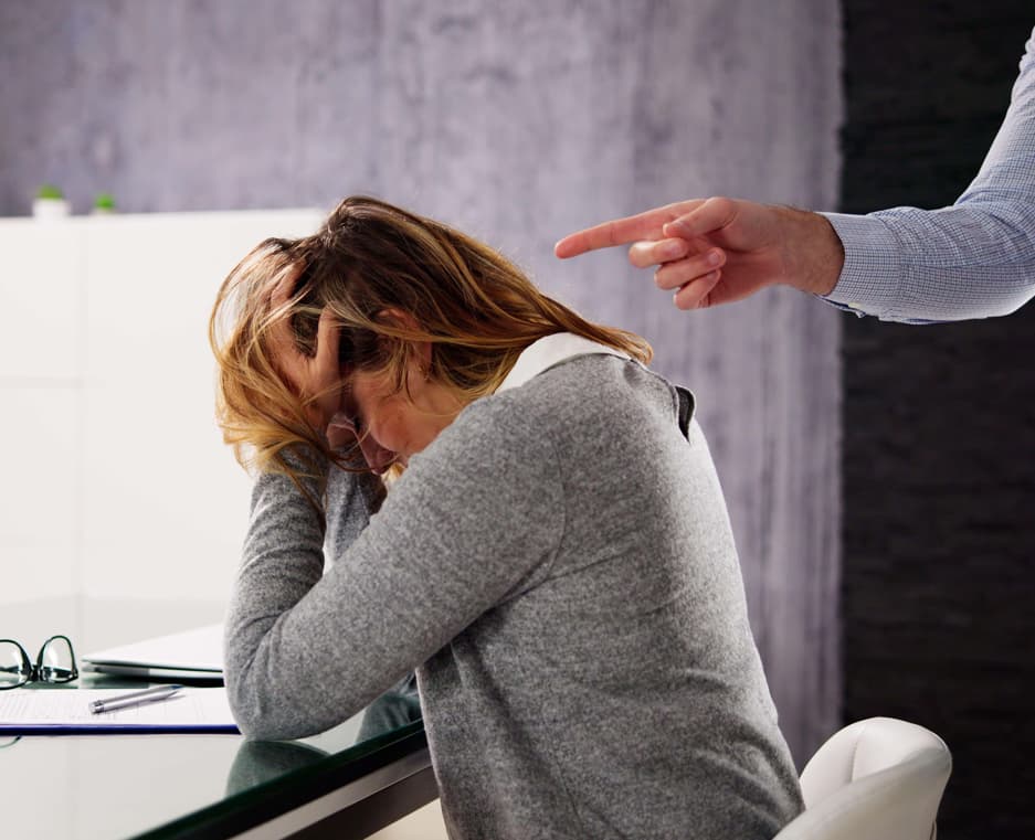 Worker under stress in a workplace